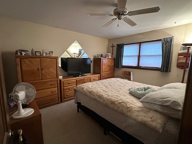 bedroom with ceiling fan and carpet