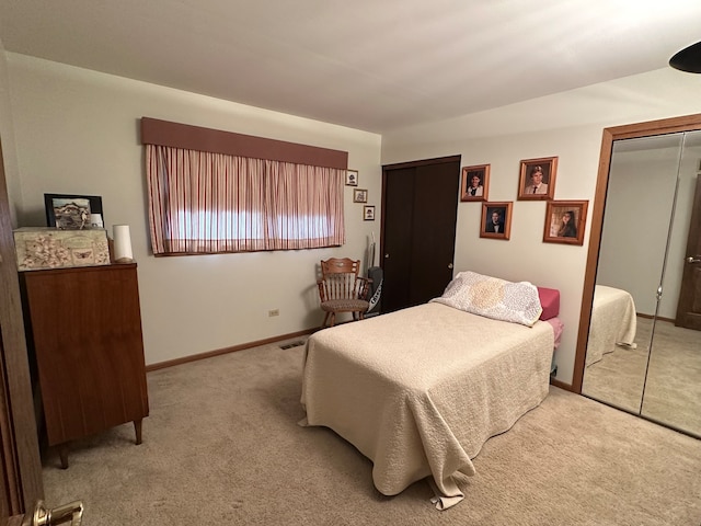 bedroom with light carpet