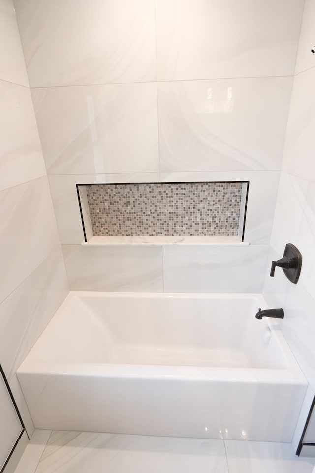 bathroom with tile patterned flooring