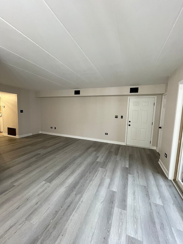 unfurnished living room with light hardwood / wood-style flooring