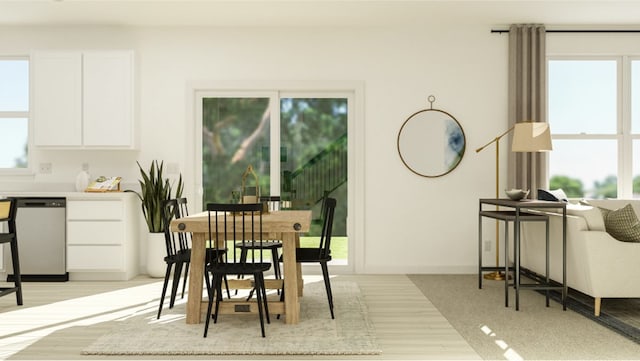 dining space featuring light hardwood / wood-style flooring