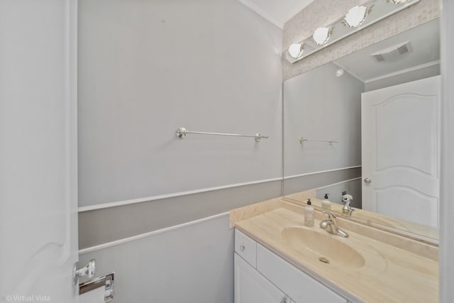 bathroom featuring visible vents and vanity