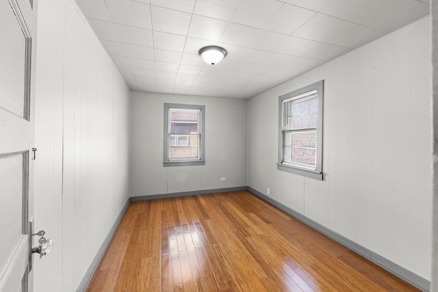 1326 Arthur Ave, Joliet, IL 60432 - unfurnished room with wood-type flooring and baseboards