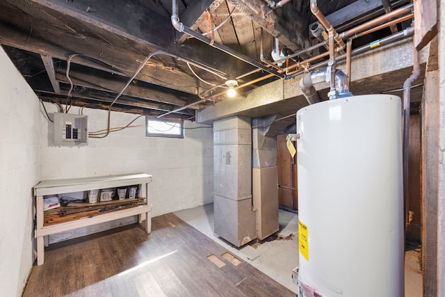 1326 Arthur Ave, Joliet, IL 60432 - below grade area featuring water heater, electric panel, heating unit, and wood finished floors