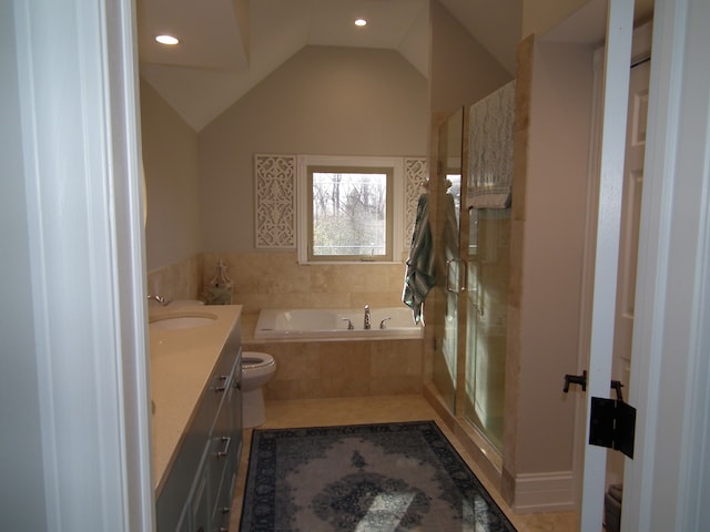 full bathroom with vanity, plus walk in shower, tile patterned flooring, toilet, and lofted ceiling