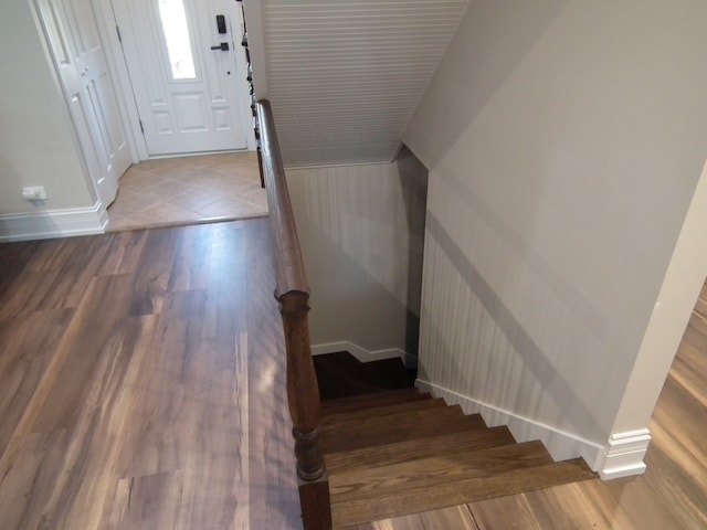 stairway featuring hardwood / wood-style floors