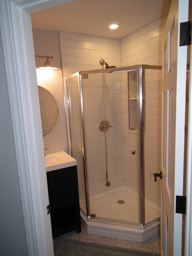 bathroom featuring vanity and walk in shower