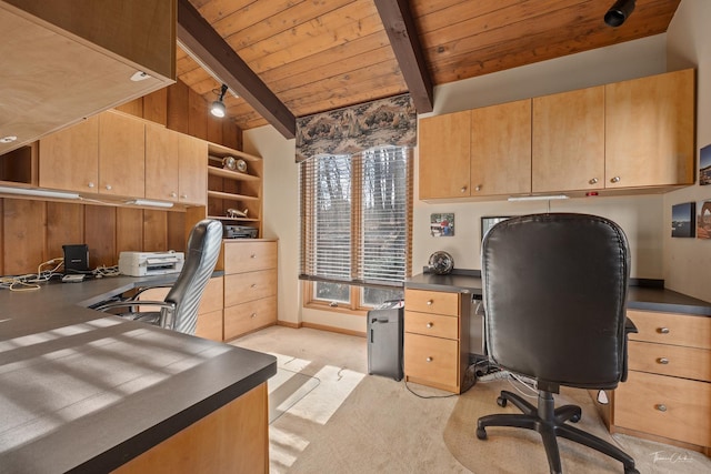 carpeted office space with lofted ceiling with beams, wooden walls, and wood ceiling