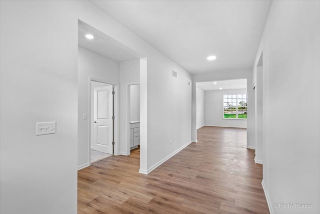 hall featuring light hardwood / wood-style flooring