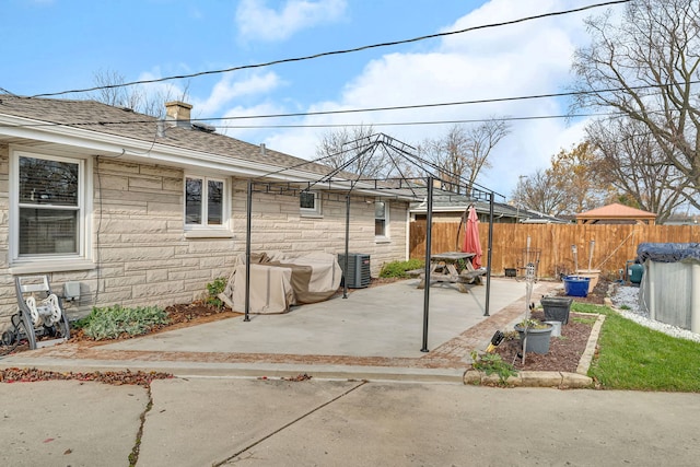 view of patio / terrace with a gazebo and cooling unit