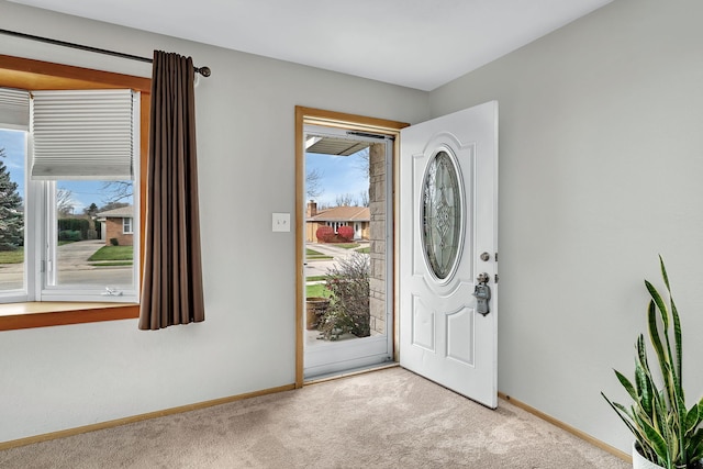 entryway with light carpet