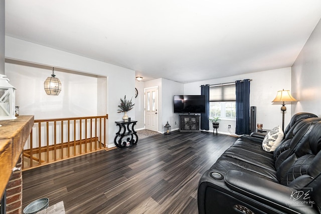 living room featuring dark hardwood / wood-style floors