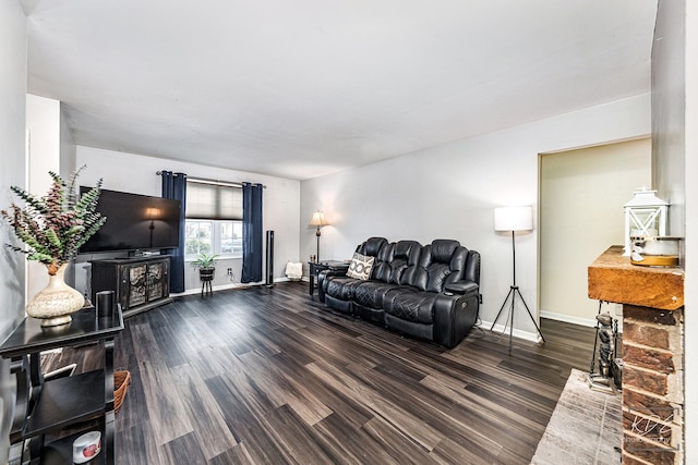 living room featuring dark hardwood / wood-style floors