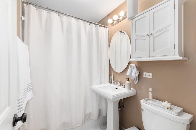 bathroom with toilet and sink