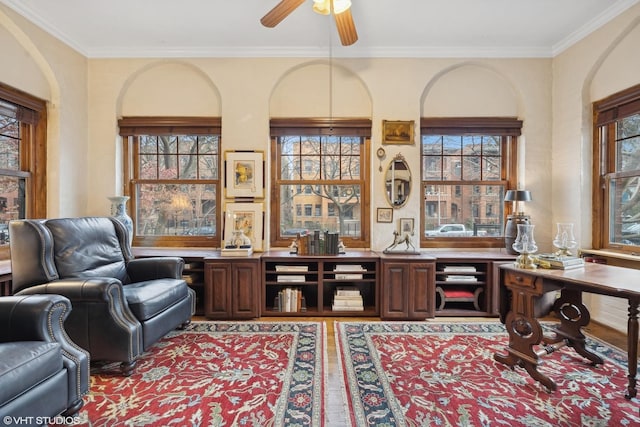 office space featuring crown molding and ceiling fan