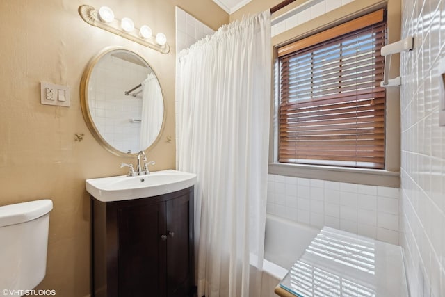 full bathroom featuring vanity, shower / bathtub combination with curtain, and toilet