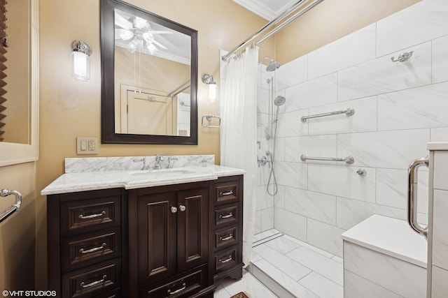 bathroom featuring a shower with curtain, ceiling fan, ornamental molding, and vanity