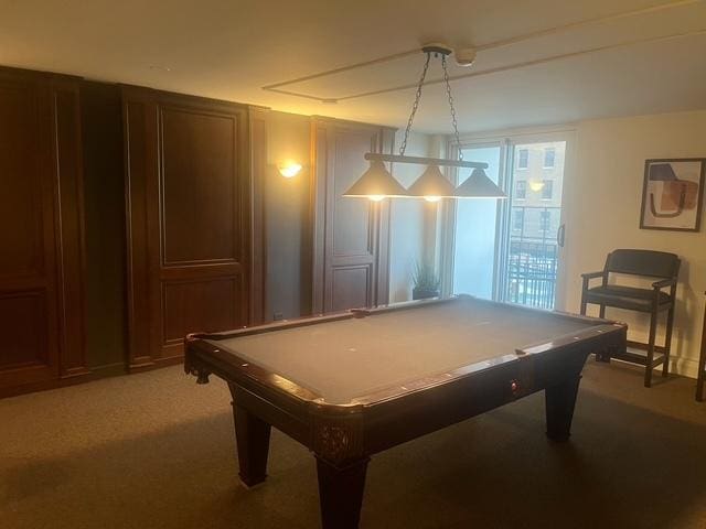 game room with billiards and carpet