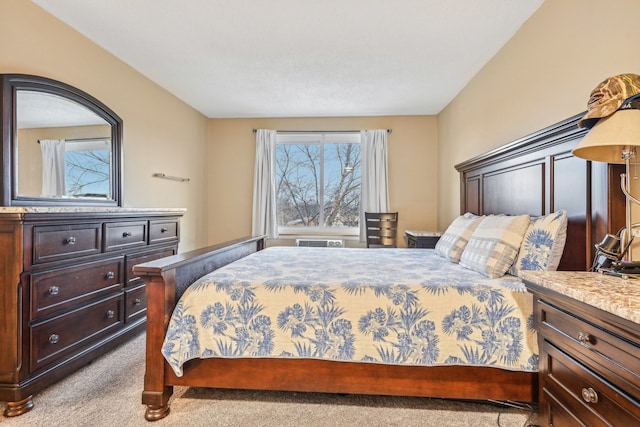 bedroom featuring light carpet