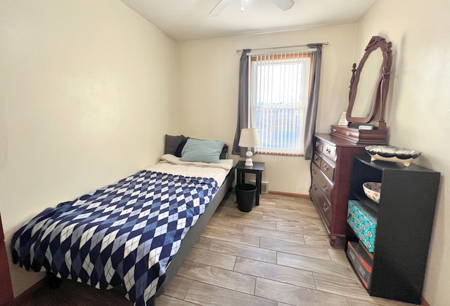 bedroom featuring ceiling fan and light wood-type flooring