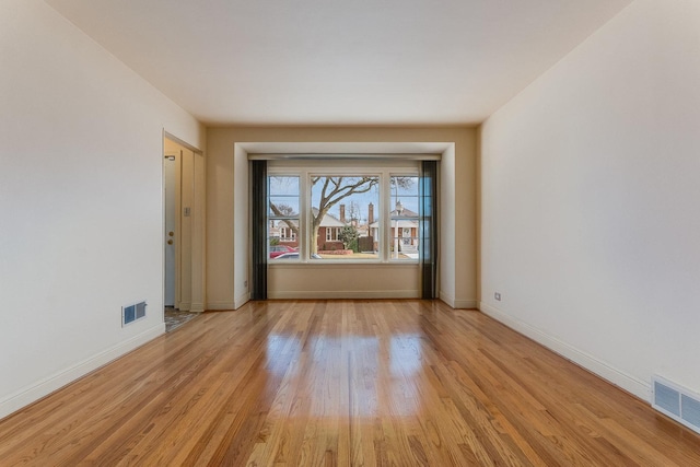 empty room featuring light hardwood / wood-style flooring