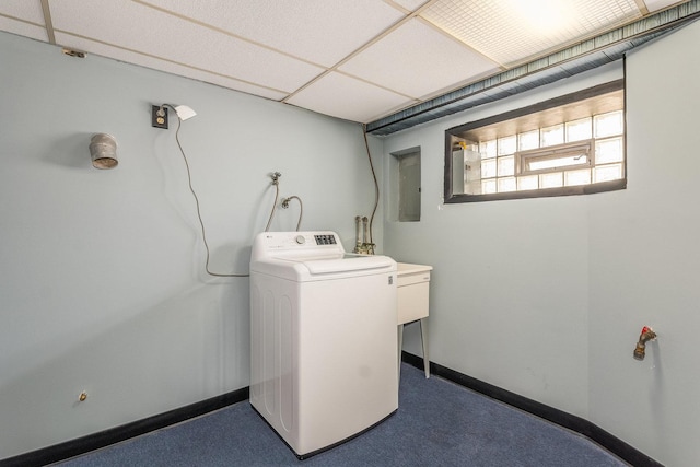 washroom featuring washer / clothes dryer and electric panel