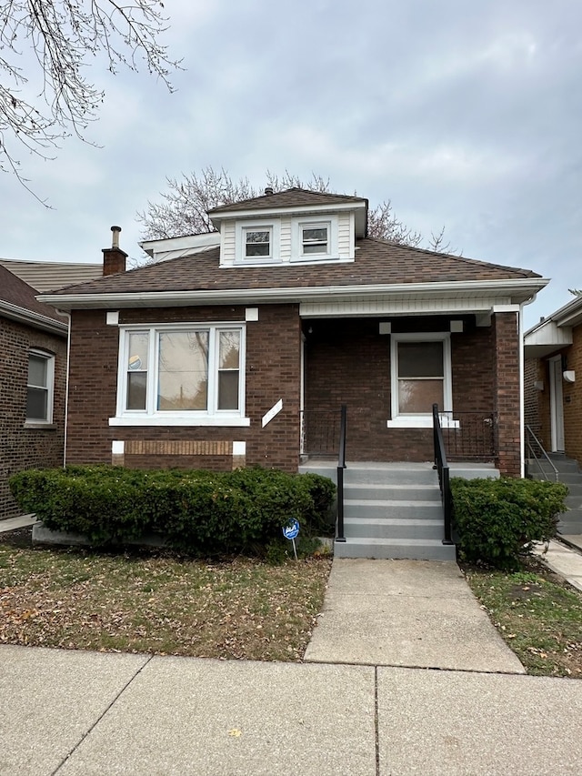 bungalow-style home with covered porch