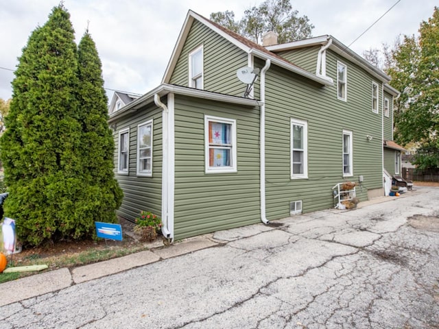 view of home's exterior with a patio