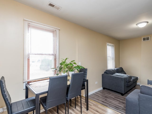 dining area featuring hardwood / wood-style floors