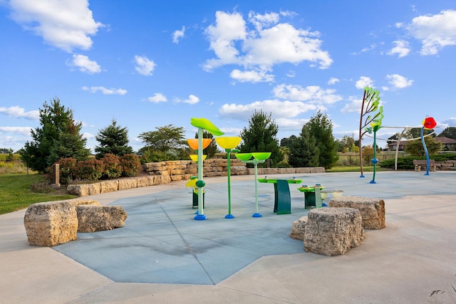 view of home's community with a playground