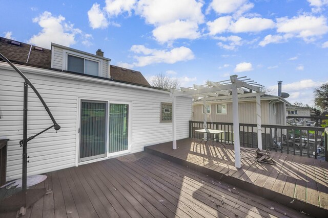 view of yard with an outdoor structure, a patio area, and a deck