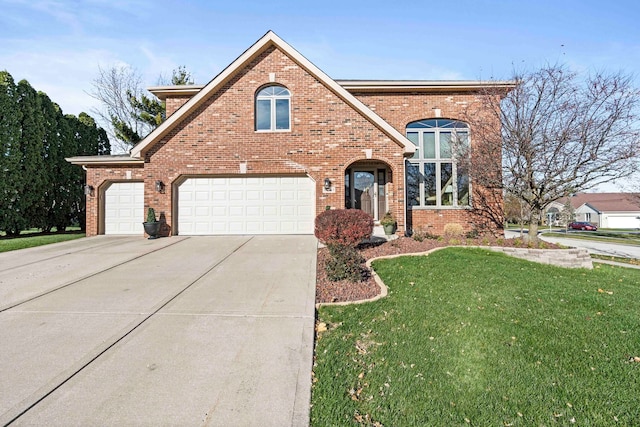 view of front of property with a garage and a front yard