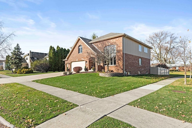 front facade featuring a garage and a front lawn