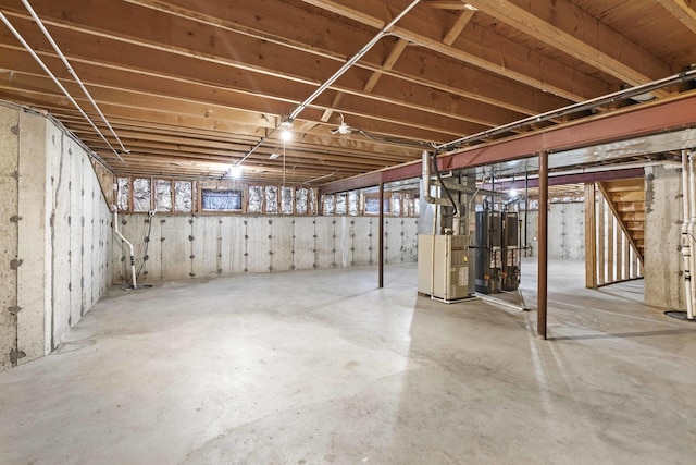 basement featuring heating unit