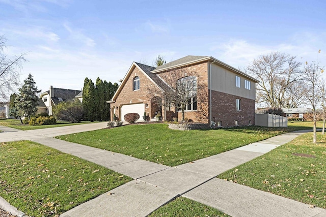 front facade featuring a garage and a front lawn