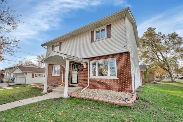 front of property featuring a front lawn