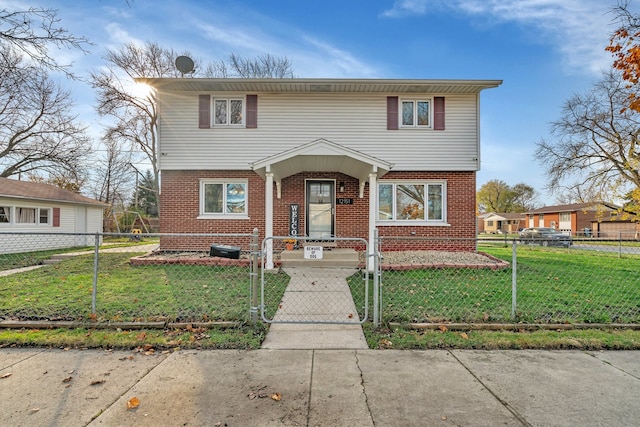 view of front of property featuring a front yard