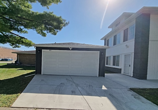 garage with a yard