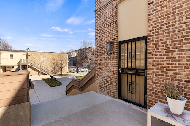 1733 N Larrabee St Unit 0, Chicago, IL 60614 - property entrance with brick siding