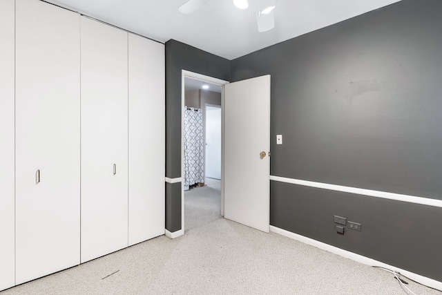 1733 N Larrabee St Unit 0, Chicago, IL 60614 - unfurnished bedroom with a closet, baseboards, a ceiling fan, and carpet flooring