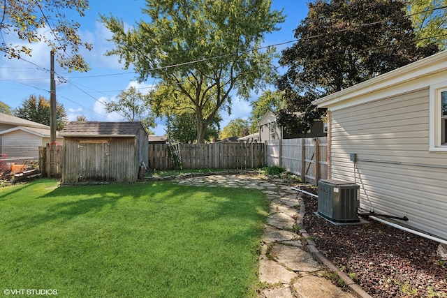 view of yard with a storage unit and cooling unit