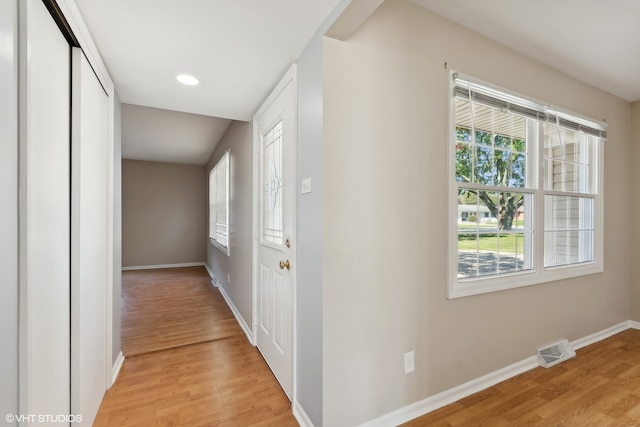 hallway featuring light wood-type flooring