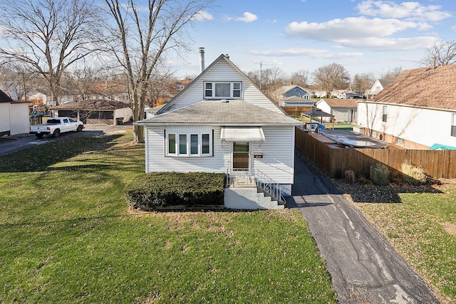 view of front of house with a front lawn