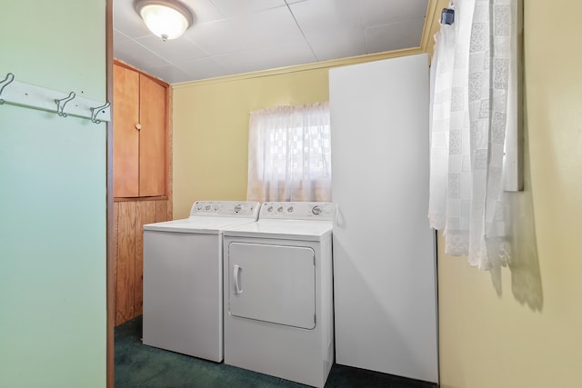 laundry area with washing machine and dryer