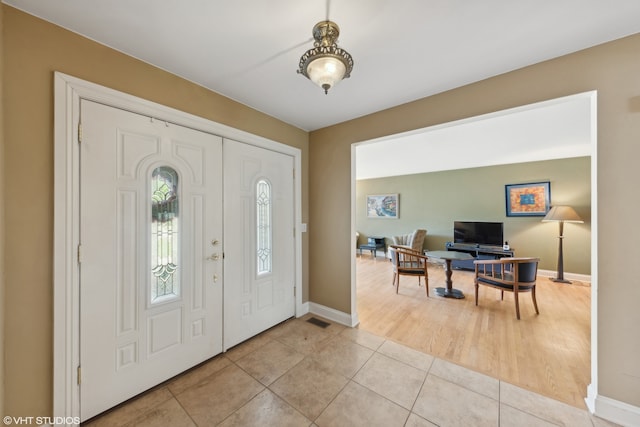 entryway with light wood-type flooring