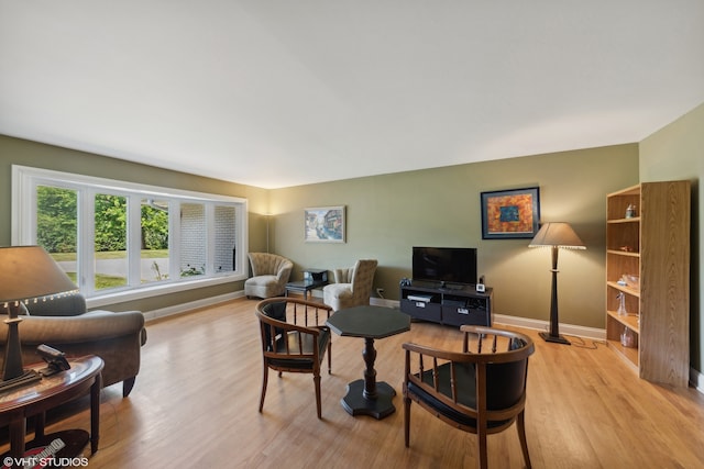 living room with light hardwood / wood-style floors