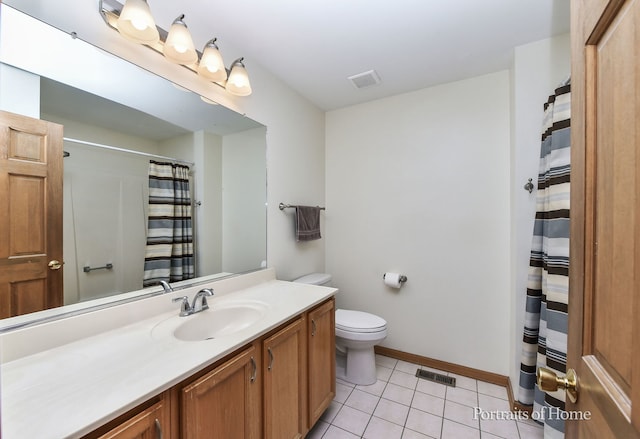 bathroom featuring a shower with curtain, tile patterned floors, vanity, and toilet