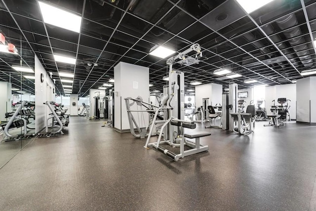 gym featuring baseboards