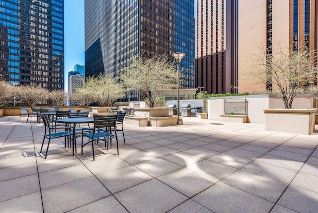 view of patio / terrace with a view of city