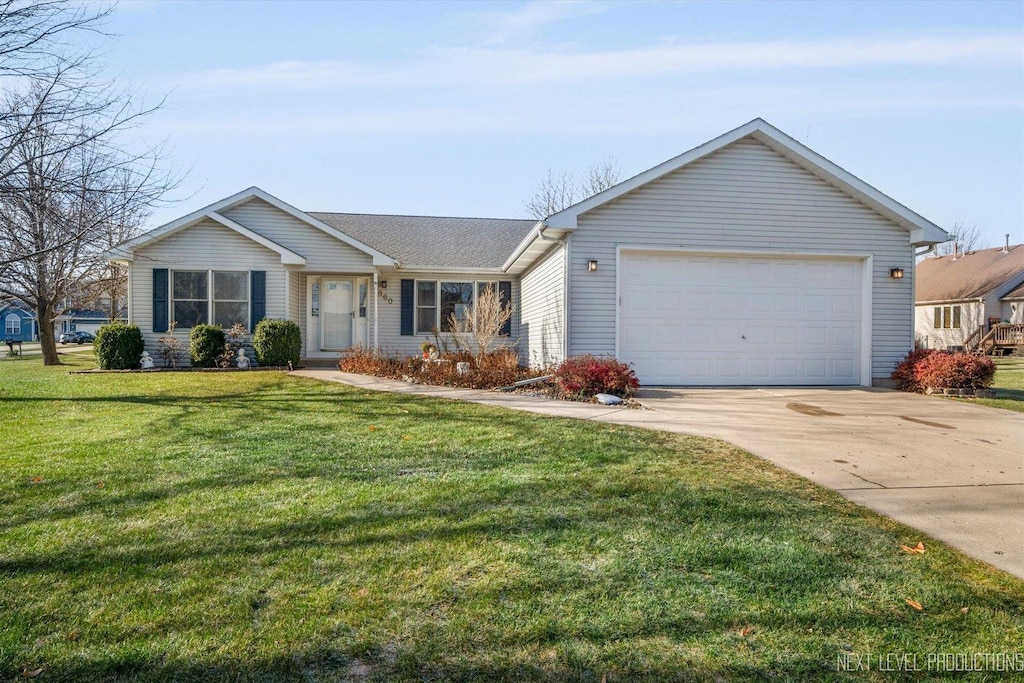 single story home featuring a front lawn and a garage